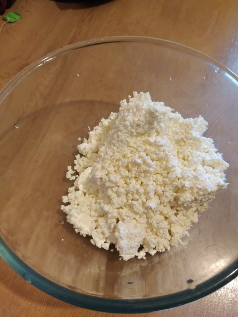 Curd cheese in a glass bowl at our home