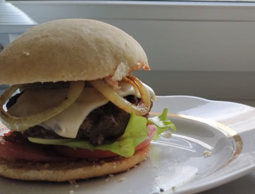 Beef burger on a white plate